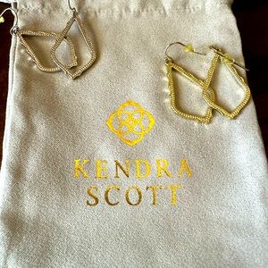 Small Kendra Scott Gold earrings.